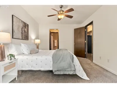 Staged primary bedroom in a home staged by Willow & Fern