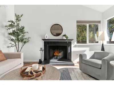 Staged fireplace seating in a home staged by Willow & Fern